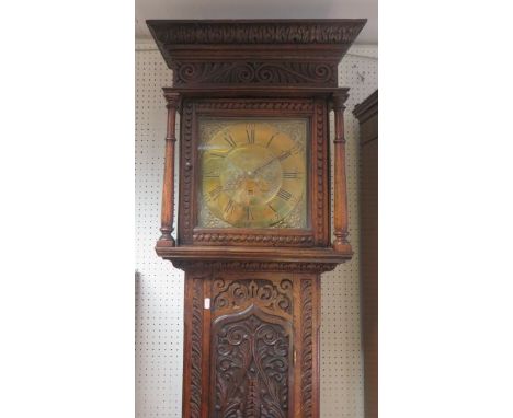 Carved oak longcase clock, with brass face with date aperture and Roman Numeral dial, with engraved name Mary Stobert, Borrou