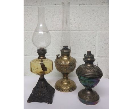 An American brass oil lamp, together with two Victorian oil lamps with all three lacking shades