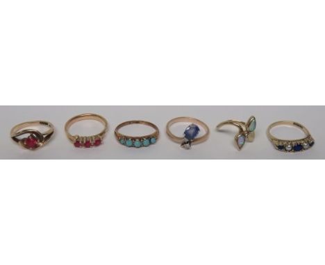 A marked 375 pink sapphire dress ring, ring size N, together with, a marked 375 seed pearl and blue stone dress ring, ring si