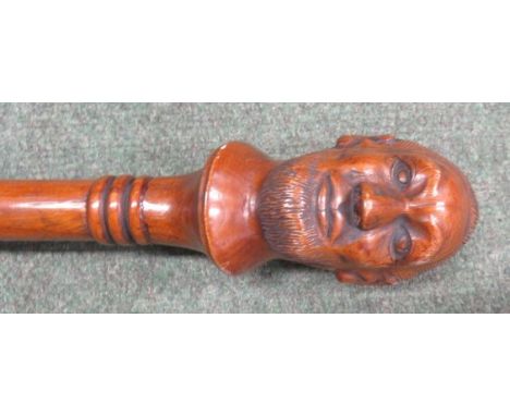 Victorian walking stick with carved finial head of a Gentleman, 88cm long