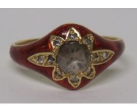 A gold diamond and red guilloche enamel ring, set with a central old rose cut diamond measuring approximately 4.8mm in diamet