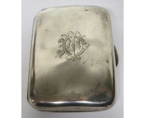 Silver cigarette case with engraved decoration to the front centre, and May 15th 1908 to the front bottom right, hallmarked f