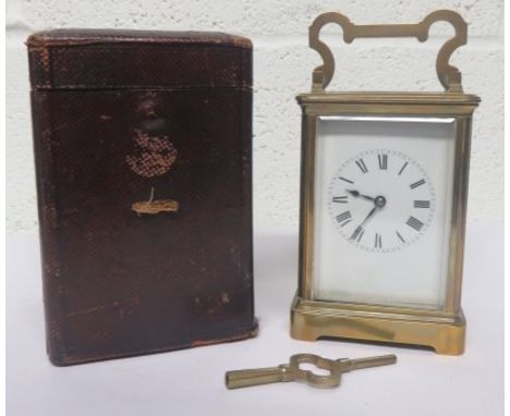 19th century brass and gilt carriage clock, with Roman Numeral dia and leather carrying case