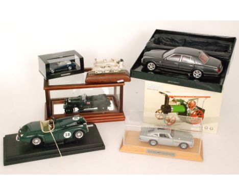 A Bentley Arnage T scale model, a Minichamps Bentley S2 cabriolet, an Aston Martin DB5 three similar models and Mamod steam t