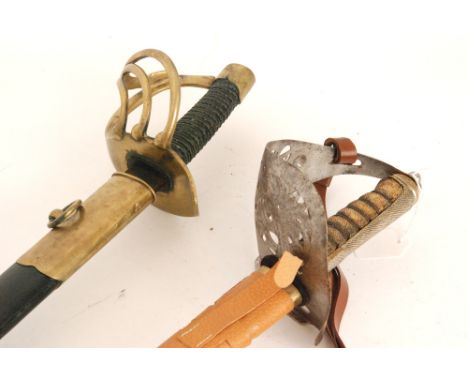 Amendment - A 20th Century officer's dress sword with later brown scabbard and pierced basket hilt, 89cm blade, also a small 