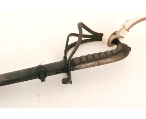 Amendment - A 20th Century officers dress sword with ray skin handle, pierced hilt and steel scabbard, 81cm blade