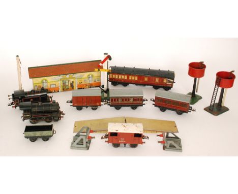 A Hornby 0-4-0 tank 0 gauge tank locomotive No 60199, another No 82011, also various coaches and rolling stock, buffers, wate