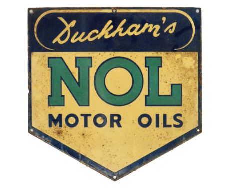 A single sided advertising enamel sign for Duckham's NOL Motor Oils, the shield shape with yellow, green and blue letters on 