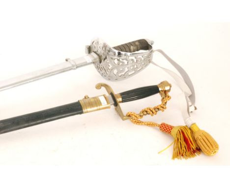 A 20th Century artillery officer's sword by J R Gaunt Ltd London, 90cm blade, also a brass hilt dress sword, the 79cm blade s