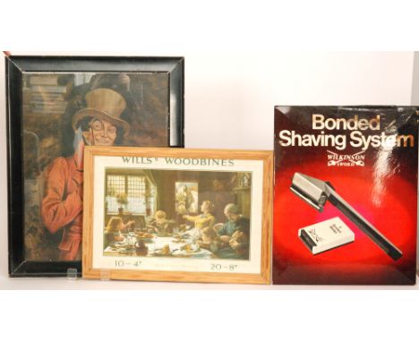 Three post war pictorial advertising shop display signs, the first a framed print for Will's Woodbines 'One of the Family', t