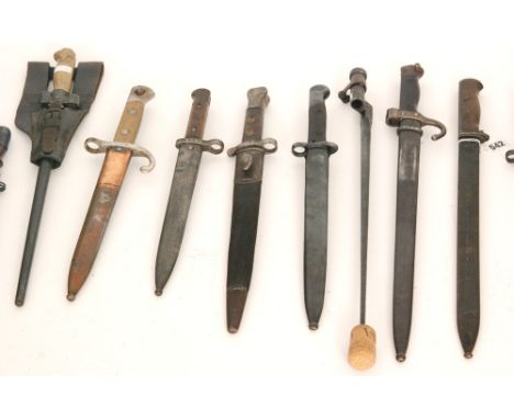 A late 19th Wilkinson pattern bayonet with leather scabbard, another stamped Simpson & Co Sutte and eight other 19th and 20th