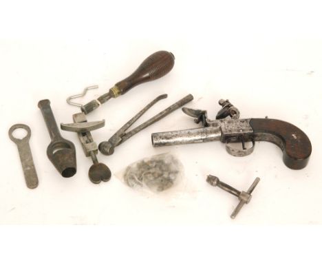 A 19th Century pocket flintlock pistol with 6cm twist off barrel, indistinctly signed and plain grip, together with pistol mo