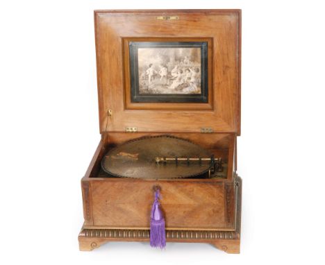 A Polyphon disc musical box serial No 120170 playing 15 1/2in discs, with single comb in marquetry inlaid walnut case, width 