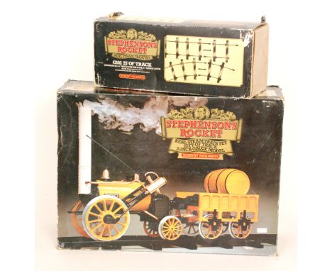 A Hornby 3 1/2in gauge model of Stephensons rocket together with a quantity of track, boxed