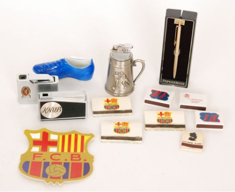 A Panther regal table top cigarette lighter with Aston Villa badge emblem, a similar KNVB example, a lighter in the form of a