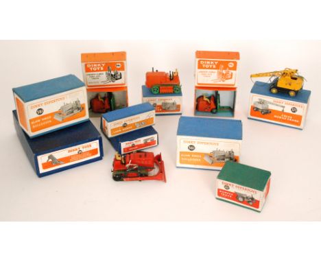 Two Dinky Supertoys Blaw Knox bulldozers No 561, Coles Mobile Crane No 571, Heavy Tractor No 563, Lawn Mower No No751, Dumper