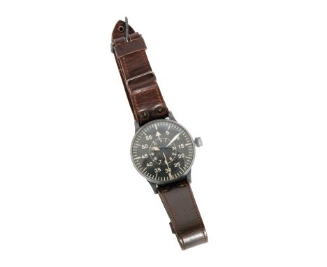A World War Two German Luftwaffe Pilot's 'B-Uhr' watch, ref. 127 - 560B, the circular black dial 'B' dial with Arabic numeral