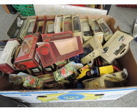 A shelf of Matchbox and Lledo die-casts including Models of Yesteryear, Days Gone etc, most in window boxes, approx 60