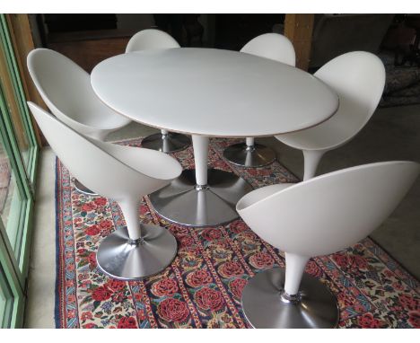 A Magis Bombo white oval table 170cm x 110cm and six matching swivel chairs - retails around £5000 - in good condition, very 