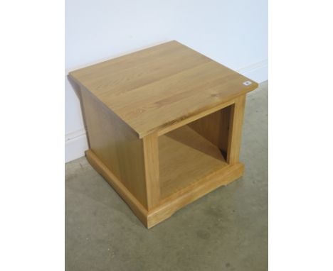 A solid oak lamp table - Height 50cm x Width 55cm x Depth 55cm 