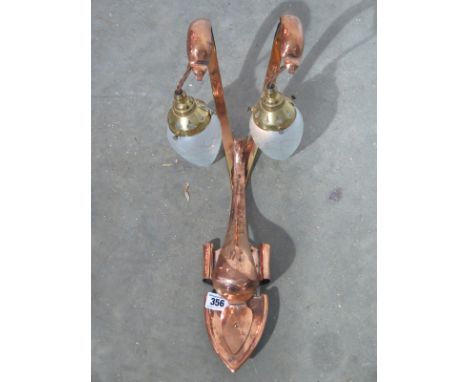 An Art Nouveau copper twin glass wall lamp - Height 47cm