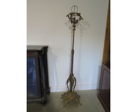 An ornate gilt metal standard conservatory lamp - Height 171 cm 
