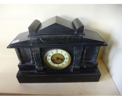 A black Belgium slate mantel clock with Arabic numerals to white enamel chapter ring Condition report: No pendulum or key