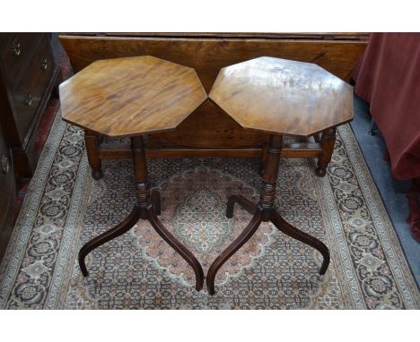 A pair of George III mahogany tripod occasional tables with octagonal tops, 39.5 cm dia. x 71.5 cm h (2)