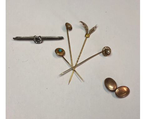 A collection of antique stick pins, one yellow metal set small turquoise, 14ct yellow metal with small pearl, paste set, one 