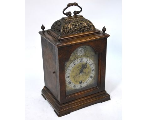 A Georgian style walnut cased mantle clock with 8-day Smiths movement, with arched dial 27 cm h&nbsp;