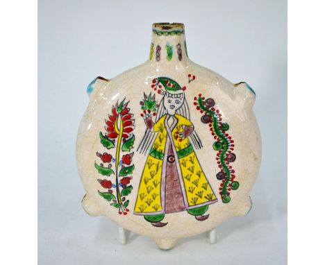 An 18th century style Turkish Kutahya ware pottery water flask, each side painted with the traditional design of a lady in lo