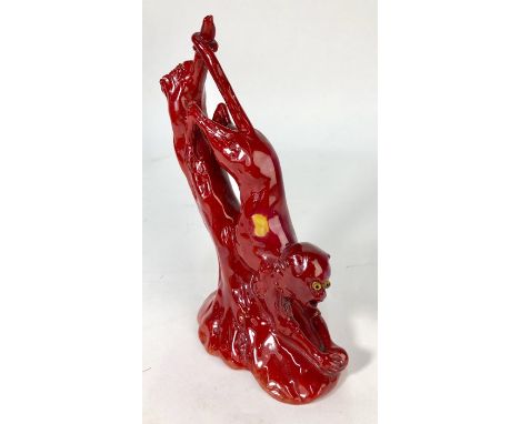 Bernard Moore flambe model of a monkey with glass eyes descending a hollow tree trunk, impressed Moore to base, 15 cm highTin