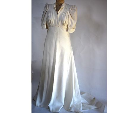 A bespoke ivory wedding dress with weighted short train, to/w an ivory silk satin dress made from a 19th century wedding dres