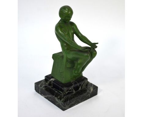 After Max Le verrier (1891-1973) a French Art Deco green painted figural table lamp, 'Delassement', raised on a stepped marbl