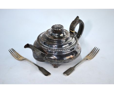 A George IV silver teapot of compressed form, with foliate finial, handle with ivory insulators and scroll and pad feet, Henr