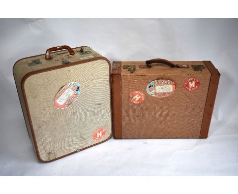 Two vintage canvas and leather bound suitcases with Cunard Line and other travel labels, to/w a small circular vellum suitcas