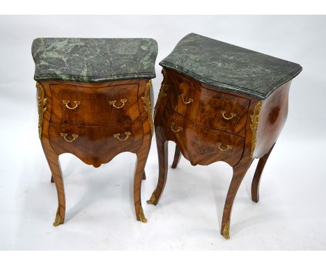 A pair of continental gilt mounted green marble top, serpentine form two drawer commode chests, on shaped legs, 49 cm w x 33 