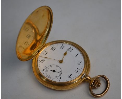 A Continental 14ct gold full hunter pocket watch with top-wind movement, 46 mm enamel dial with subsidiary seconds, maker DCW
