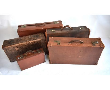 A collection of six vintage suitcases (some leather examples), to/w a canvas and wood bound travel trunk (7)