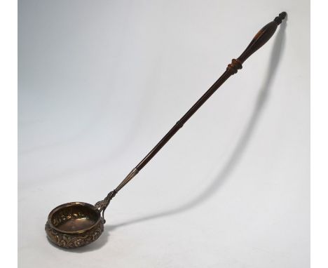 A William IV Scottish silver punch ladle with foliate-chased bowl, on turned wood handle, David McDonald, Glasgow 1836, 46 cm