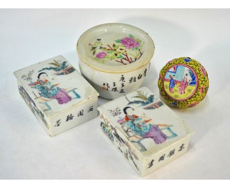 Two Chinese porcelain famille rose rectangular boxes and covers, painted with figures in a garden setting and four character 