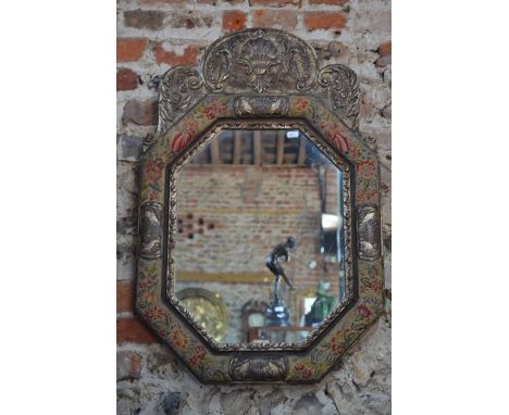 A pair of William &amp; Mary style mirrors, the needlepoint panelled cushion frames of octagonal form, surmounted by relief m
