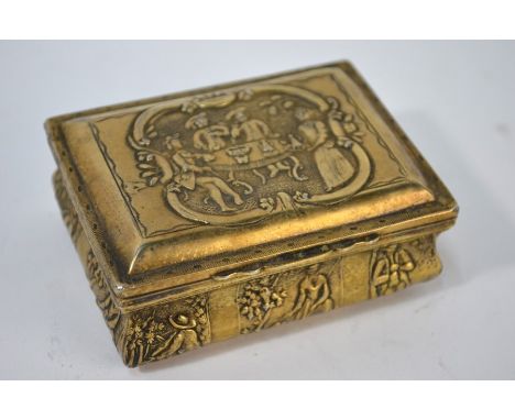 An 18th century Dutch silver gilt snuff box, embossed and chased with rustic figures, 8 cm wide