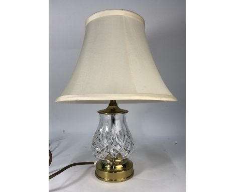 A Waterford crystal table lamp with silk shade, 22 cm high to top of light fitting (2)No chips or cracks to the bases. &nbsp;