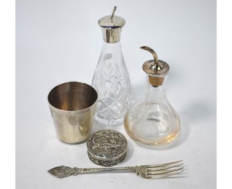 Two cut glass bitters bottles with silver tops, Birmingham 1959/89, to/w a French .950 grade engraved beaker, 6 cm high, a Vi