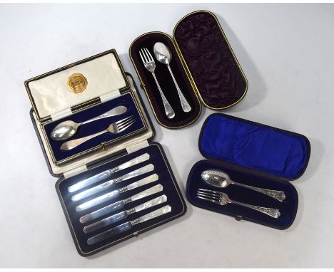 A cased set of six silver tea-knives with carved mother-of-pearl handles, James Dixon &amp; Son, Sheffield 1922, to/w two Vic