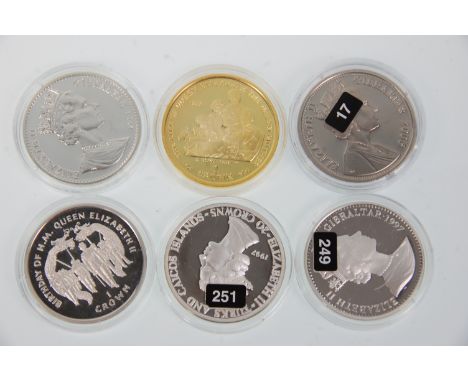 A group of six silver coins (one gold plated example) to include 1997 20 Crowns 'Lady Of The Century' coin, 2x 1997 Gibraltar