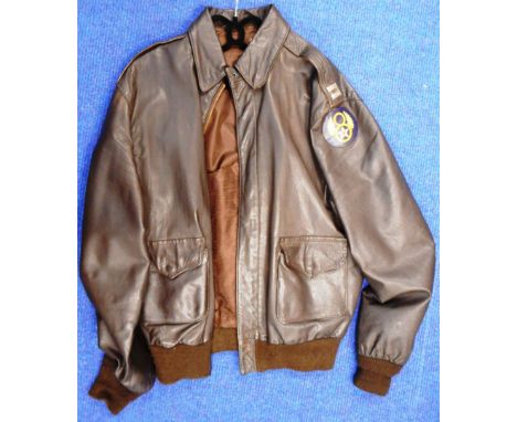 Repro U.S. Army Air Corps A2 leather jacket. With captain's insignia and 8th Air force flash.