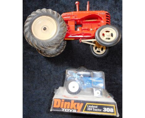 Dinky. 308 Leyland 384 tractor. Blue. Boxed. Lesney Larger scal Massey-Harris 745D tractor. Red. Average. 20cm long. Un-boxed