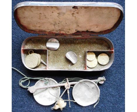 Set of Georgian gold scales with weights. In tin box.